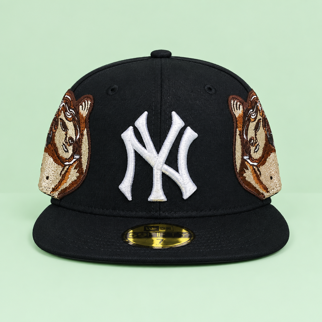 Black flat-brim cap with white front embroidery and portrait patches on mint green background