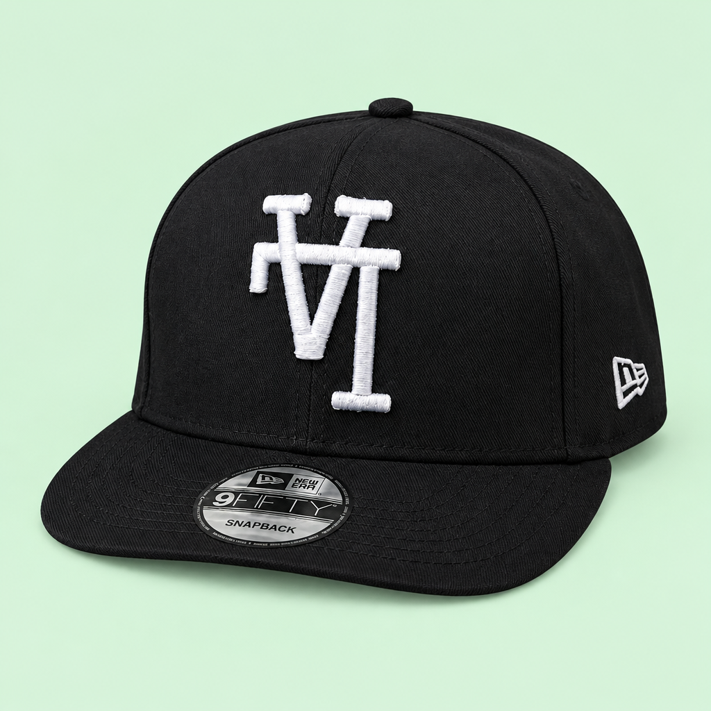 Black snapback cap with white front embroidery, right three-quarter view
