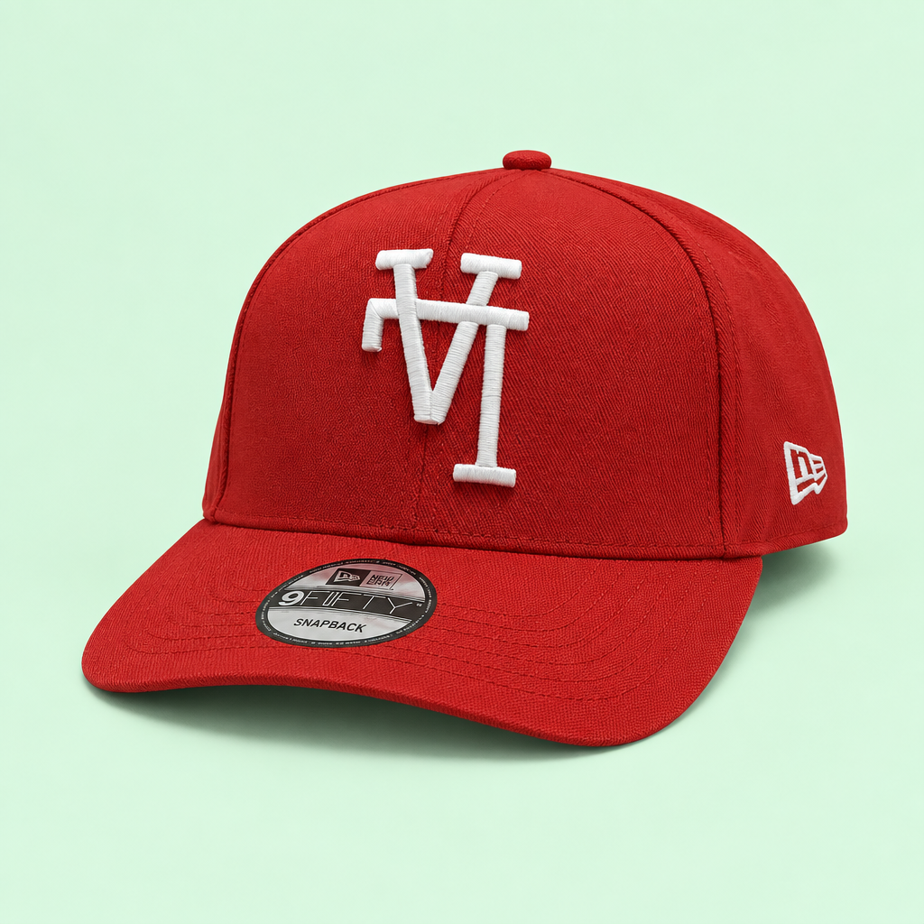 Red cap with white raised embroidery, right three-quarter angle on pastel mint background
